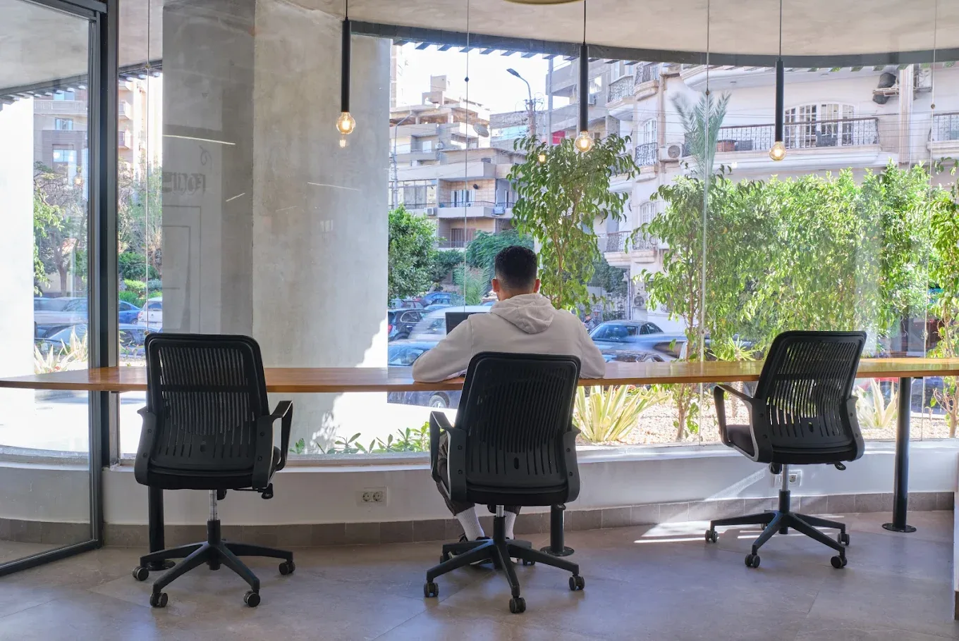 Coworker workspace with window seating